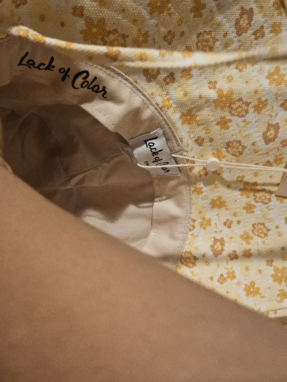 Lack of Color Holiday Bucket Hat in the Peach Bloom pattern